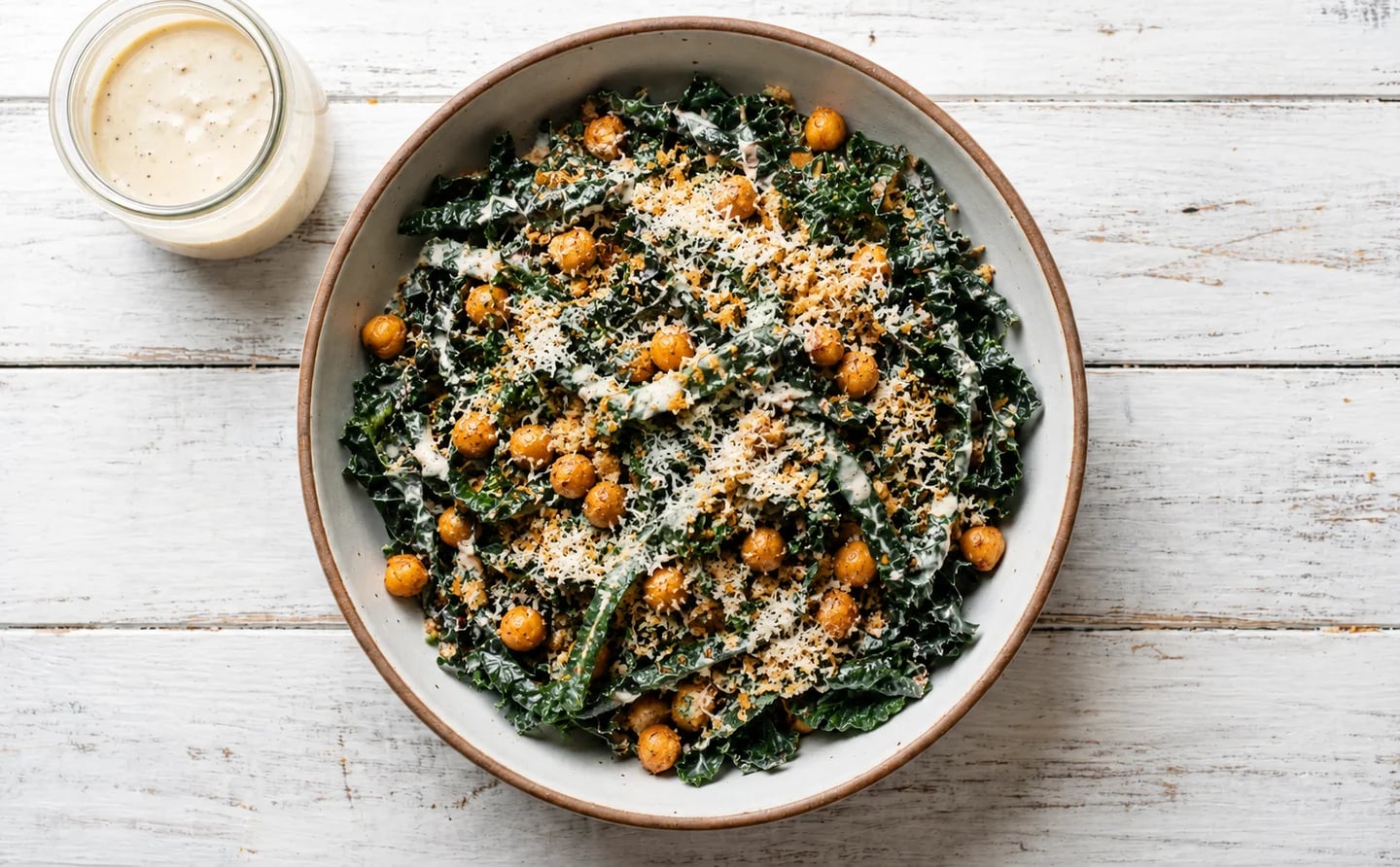 Bowl of kale Caesar salad with chickpeas