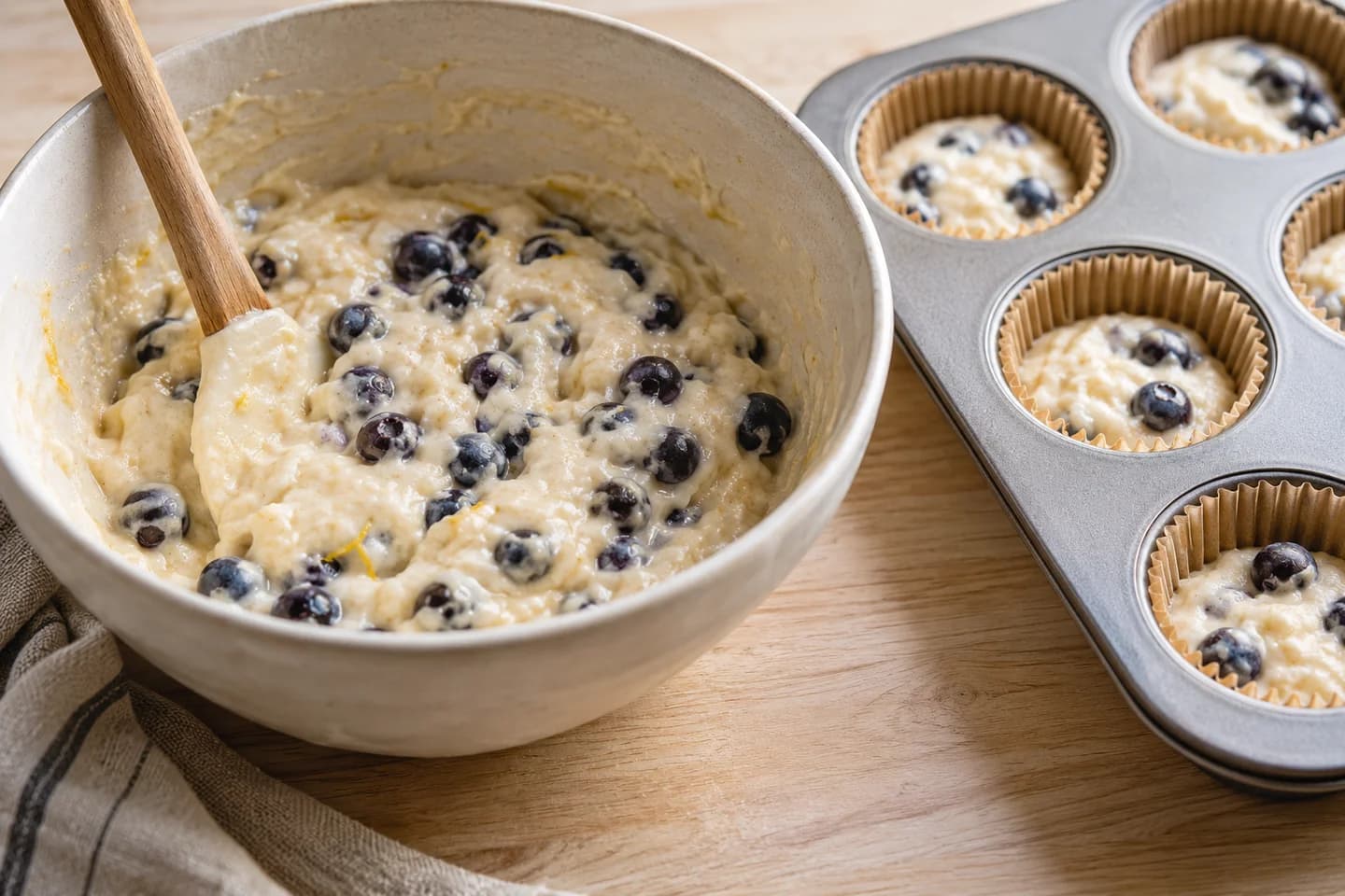 Blueberry Lemon Muffins: Fold wet into dry, then gently fold in blueberries