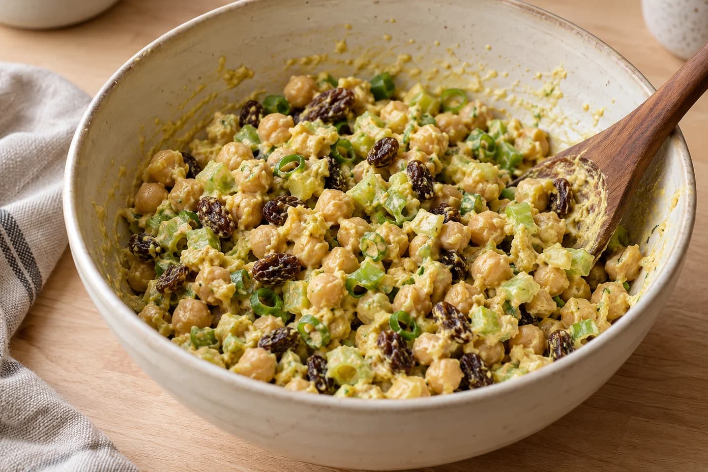 Curried Chickpea Salad Wraps: Combine chickpeas, dressing, celery, raisins and scallions
