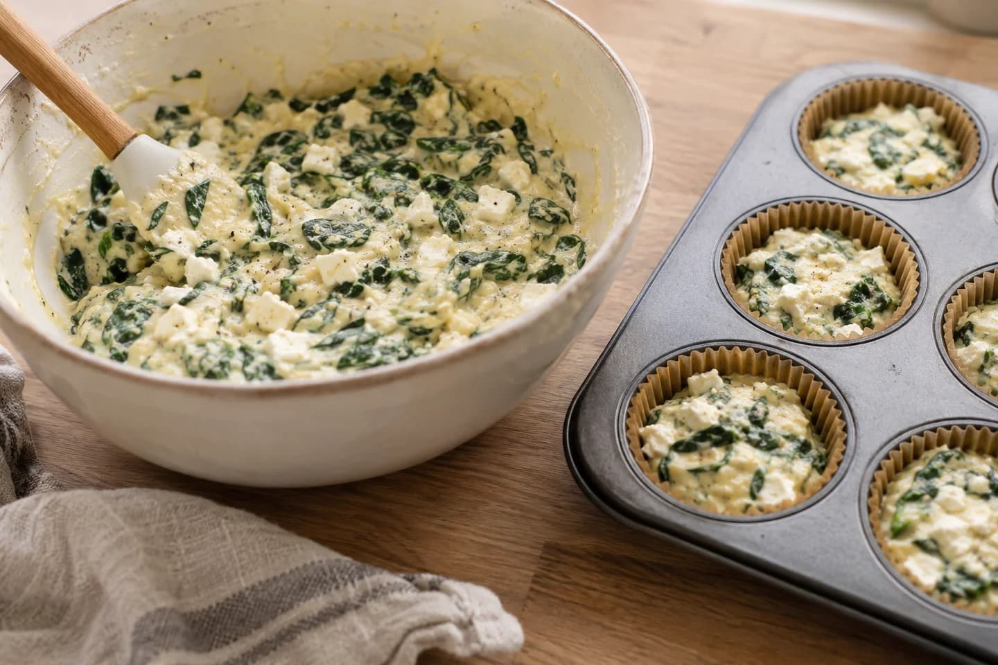 Spinach Feta Breakfast Muffins: Combine the mixtures, then fold in spinach and vegetarian feta